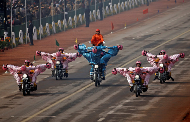 The Indian Border Security Force (BSF) “Daredevils” women motorcycle riders perform during the Republic Day parade in New Delhi, India January 26, 2018. (Photo by Adnan Abidi/Reuters)