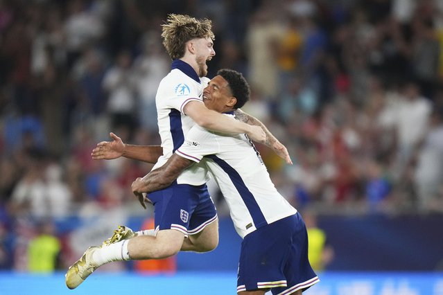 England's Harvey Elliott and Jarell Quansah, right, celebrate at the end of the European U-21 Championship final soccer match between England and Germany at the National Football Stadium in Bratislava, Slovakia, Saturday, June 28, 2025. (Photo by Petr David Josek/AP Photo)