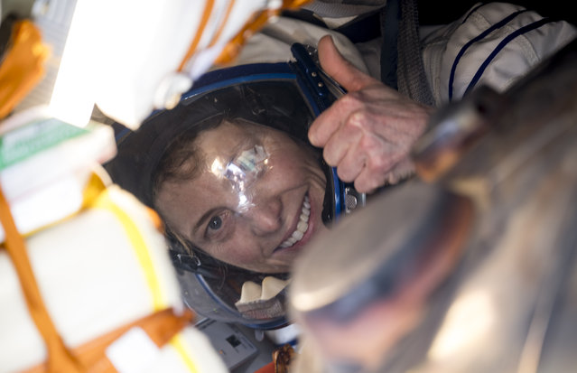 In this handout image provided by NASA, Expedition 70 NASA astronaut Loral O'Hara gives a thumbs up inside the Soyuz MS-24 spacecraft after she, Roscosmos cosmonaut Oleg Novitskiy, and Belarus spaceflight participant Marina Vasilevskaya, landed in a remote area on April 6, 2024 near the town of Zhezkazgan, Kazakhstan. O'Hara is returning to Earth after logging 204 days in space as a member of Expeditions 69-70 aboard the International Space Station and Novitskiy and Vasilevskaya return after having spent the last 14 days in space. (Photo by Bill Ingalls/NASA via Getty Images)
