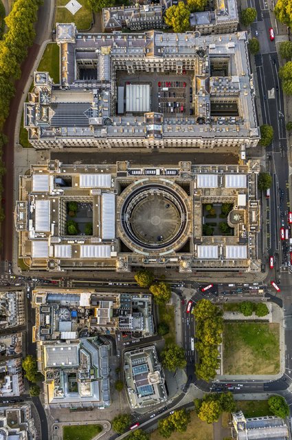 The large circular court in the Treasury building is striking from above. Beyond it near the top of the image are the Foreign Office and Downing Street. (Photo by Jeffrey Milstein/Rex Features/Shutterstock)