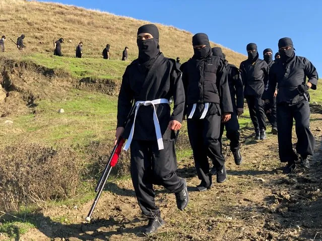 Iraqi Kurds demonstrate their Ninja-style skills in Soran district, Iraq on November 24, 2020. (Photo by Kawa Omar/Reuters)