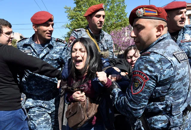 A demonstrator is detained by police during a protest against Armenia's ruling Republican party's nomination of former President Serzh Sarksyan as its candidate for prime minister, in Yerevan, Armenia April 16, 2018. (Photo by Hayk Baghdasaryan/Reuters/Photolure)