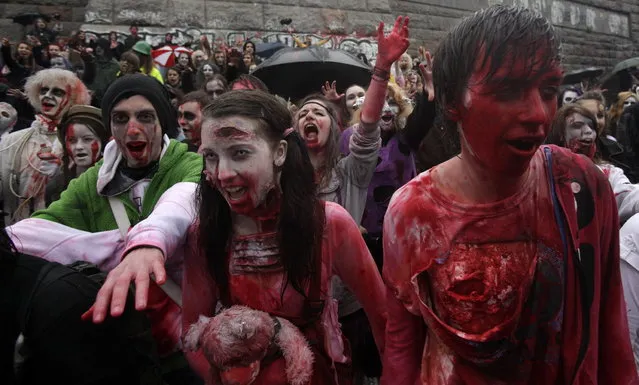 Enthusiasts dressed as zombies take part in the annual Zombie Walk festival in Prague June 1, 2013. (Photo by David W. Cerny/Reuters)