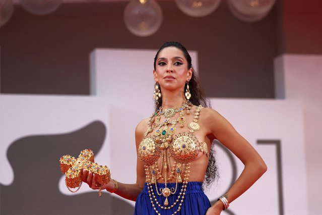 A guest poses on the red carpet during arrivals for the screening of the movie “The Room Next Door”, in competition, at the 81st Venice Film Festival, Venice, Italy, on September 2, 2024. (Photo by Louisa Gouliamaki/Reuters)