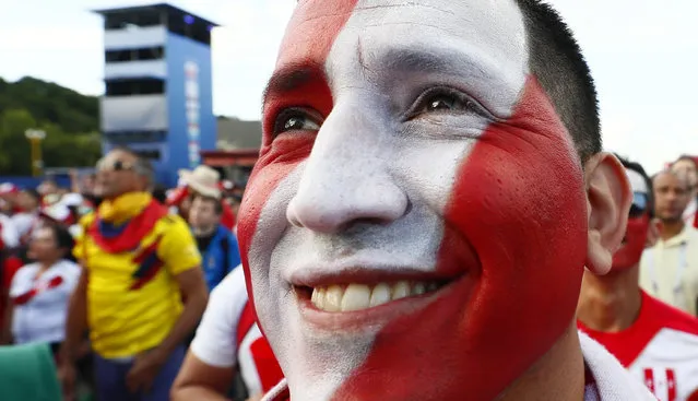 A Peru's fan cheers prior to the Russia 2018 World Cup Group C football match between France and Peru at the Ekaterinburg Arena in Ekaterinburg on June 21, 2018. (Photo by Gleb Garanich/Reuters)