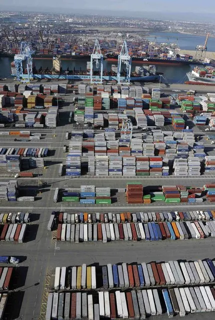 Shipping containers sit idle at the ports of Los Angeles and Long Beach, California in this aerial photo taken February 6, 2015. (Photo by Bob Riha, Jr./Reuters)