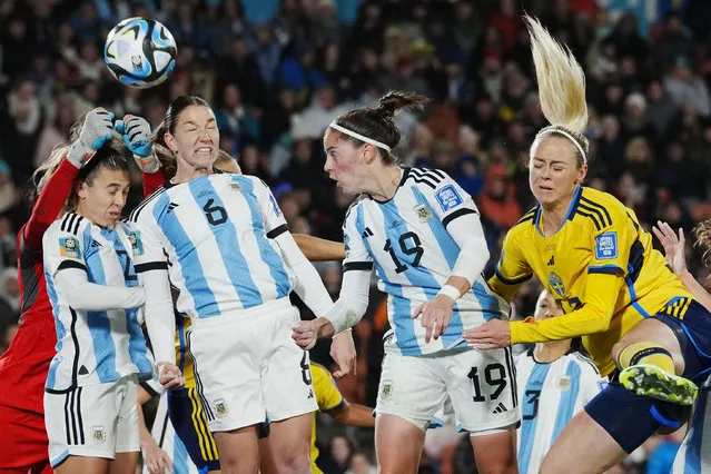 Argentina's goalkeeper Vanina Correa, from left, Argentina's Adriana Sachs, Argentina's Aldana Cometti, Argentina's Mariana Larroquette and Sweden's Amanda Ilestedt challenge for the ball during the Women's World Cup Group G soccer match between Argentina and Sweden in Hamilton, New Zealand, Wednesday, August 2, 2023. (Photo by Abbie Parr/AP Photo)