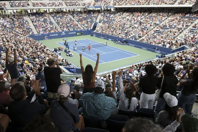 Tennis fans cheer during a match between Sloane Stephens, of the United States, and Beatriz Haddad Maia, of Brazil, during the first round of the U.S. Open tennis championships, Monday, August 28, 2023, in New York. (Photo by Jason DeCrow/AP Photo)