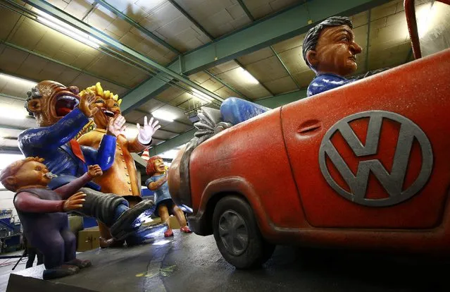 Papier mache caricature figures depicting the Volkswagen diesel emissions scandal for a carnival float, are prepared for the upcoming Rose Monday carnival parade in Mainz, Germany February 2, 2016. (Photo by Kai Pfaffenbach/Reuters)