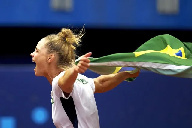 Brazil's Laura Pigossi celebrates winning the gold medal in the women's singles tennis final match against Argentina's Lourdes Carle at the Pan American Games in Santiago, Chile, Sunday, October 29, 2023. (Photo by Dolores Ochoa/AP Photo)