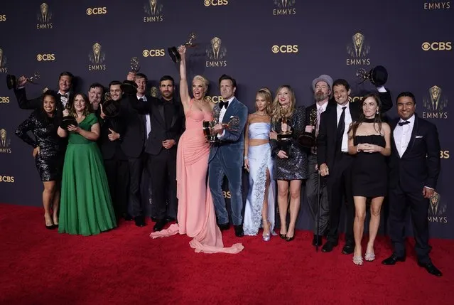 Brett Goldstein, Hannah Waddingham, Jason Sudeikis, Juno Temple and the cast and crew from “Ted Lasso” pose with their awards for outstanding supporting actor in a comedy series, outstanding supporting actress in a comedy series, outstanding lead actor in a comedy series and outstanding comedy series at the 73rd Primetime Emmy Awards on Sunday, Sept. 19, 2021, at L.A. Live in Los Angeles. (Photo by Chris Pizzello/AP Photo)