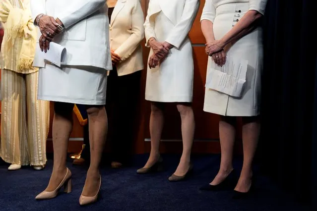 Democratic women House members stand during a briefing with the media recognizing suffragettes before the State of Union address on Capitol Hill in Washington, U.S., February 5, 2019. The lawmakers were dressed elegantly in white to celebrate 100 years of women having the right to vote. (Photo by Joshua Roberts/Reuters)