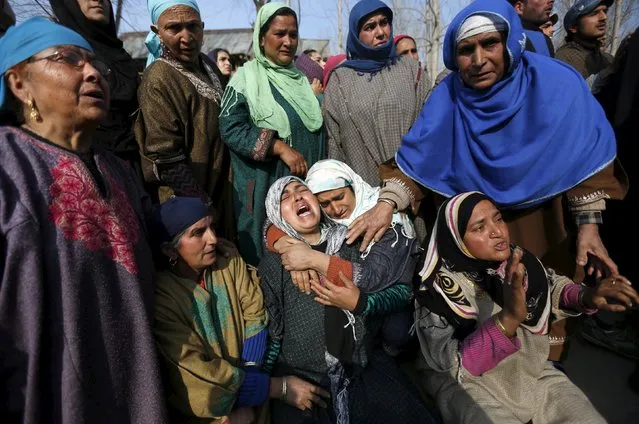 Kashmiri Muslim women wail during the funeral of Ashiq Hussain, a suspected militant, in Charsoo village in south Kashmir March 3, 2016. Three suspected militants including Hussain were killed in a gunbattle with Indian security forces and a residential house was damaged on Wednesday evening in Dadsara village in south Kashmir, local media reported. (Photo by Danish Ismail/Reuters)