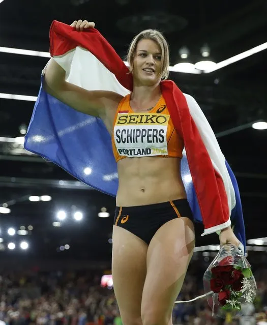 Dafne Schippers of the Netherlands celebrates her silver medal finish in the women's 60 meters final during the IAAF World Indoor Athletics Championships in Portland, Oregon March 19, 2016. Picture taken March 19, 2016. (Photo by Lucy Nicholson/Reuters)