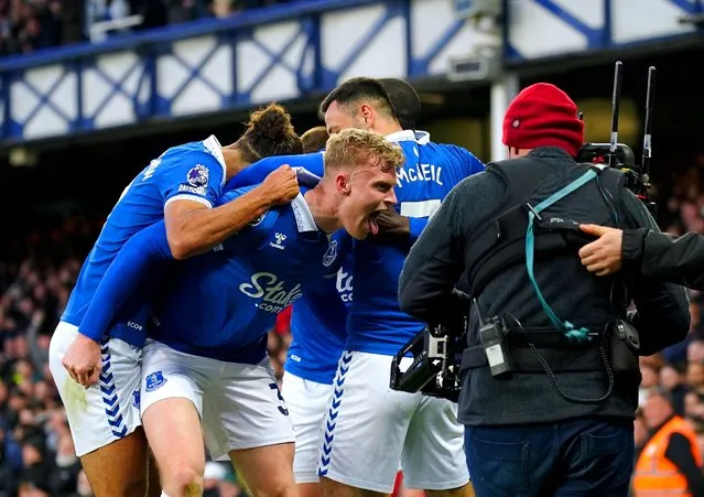 Everton's Jarrad Branthwaite celebrates with team-mates after scoring their side's first goal of the game during the Premier League match at Goodison Park, Liverpool on Wednesday, April 24, 2024. (Photo by Peter Byrne/PA Images via Getty Images)
