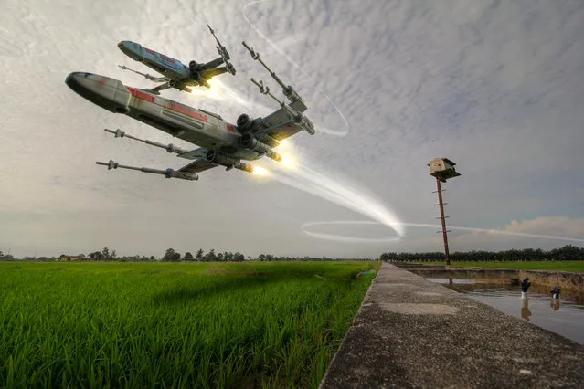 Two X Wing fighters fly over the Malaysian rice fields. (Photo by Zahir Batin/Mercury Press)