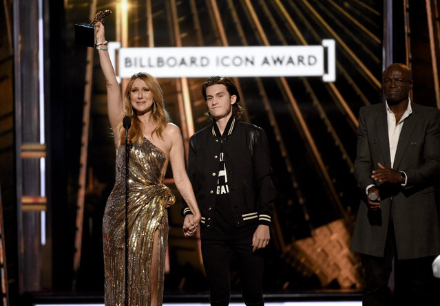 Rene-Charles Angelil presents the Icon Award to his mother, Celine Dion, at the Billboard Music Awards at the T-Mobile Arena on Sunday, May 22, 2016, in Las Vegas. (Photo by Chris Pizzello/Invision/AP Photo)