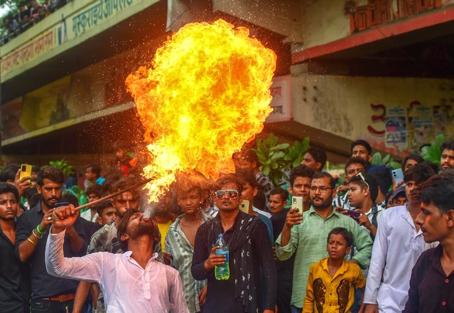 Shiite muslims take part in a a religious procession for Ashura on July 17, 2024 in Lucknow, India. Muharram is the first month of the Islamic calendar and is considered one of the holiest months. It is a time of mourning and remembrance for Shia Muslims, who commemorate the martyrdom of Imam Hussain, the grandson of Prophet Muhammad, during the Battle of Karbala. (Photo by Ritesh Shukla/Getty Images)