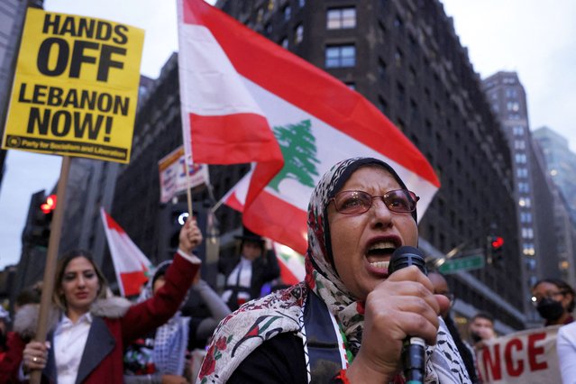 A woman leads a chant as people gather to protest the escalation of conflict between Israel and Hezbollah, in New York City on September 24, 2024. (Photo by Kent J Edwards/Reuters)