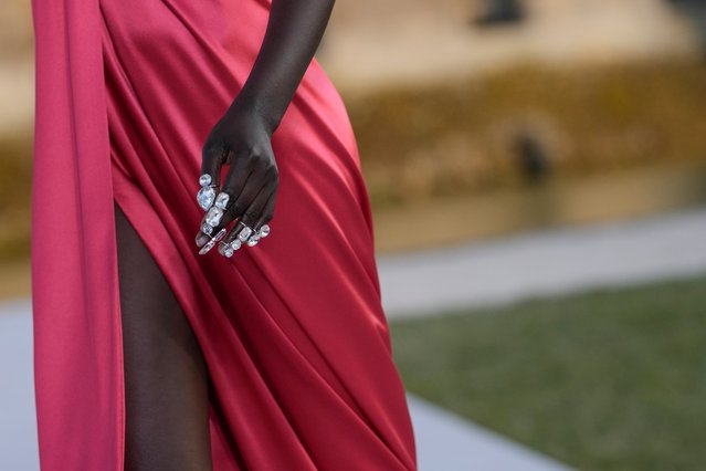 A model wears a creation for the Valentino Haute Couture Fall/winter 2023-2024 fashion collection presented in Chantilly, north of Paris, Wednesday, July 5, 2023. (Photo by Christophe Ena/AP Photo)