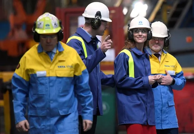 Britain's Prince William, Duke of Cambridge (2L) and his wife Britain's Catherine, Duchess of Cambridge (2R) wear hard hats and protective clothes during their visit to the Tata Steel plant in Port Talbot, south Wales on February 4, 2020. (Photo by Toby Melville/Pool via AFP Photo)