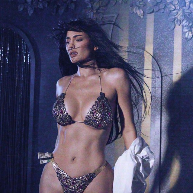 American media personality and socialite Kylie Jenner in the last decade of October 2024 strips off to recreate Demi Moore's famous Striptease scene. (Photo by Greg Swales)