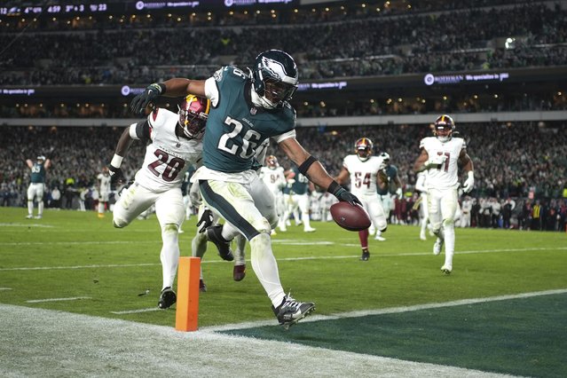 Philadelphia Eagles running back Saquon Barkley (26) scores during the second half of an NFL football game against the Washington Commanders Thursday, November 14, 2024, in Philadelphia. (Photo by Matt Slocum/AP Photo)