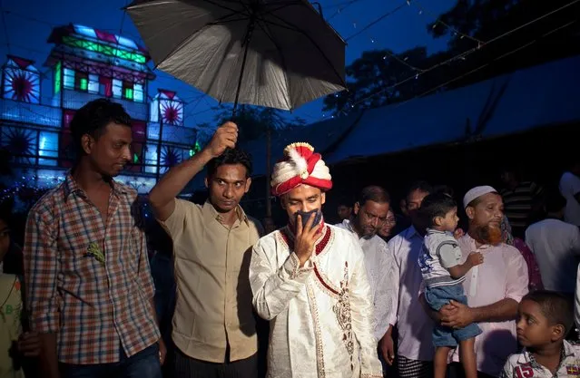 Mohammad Hasamur Rahman, 32, arrives to his wedding venue on the day that he will marry 15-year-old Nasoin Akhter on August 20, 2015, in Manikganj, Bangladesh. (Photo by Allison Joyce/Getty Images)