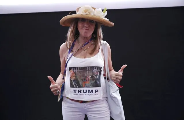 Delegate Kathy Sherman wears a pro-Trump t-shirt showing Democratic U.S. presidential candidate Hillary Clinton in prison, on the floor of the Republican National Convention in Cleveland, Ohio, U.S. July 21, 2016. (Photo by Brian Snyder/Reuters)