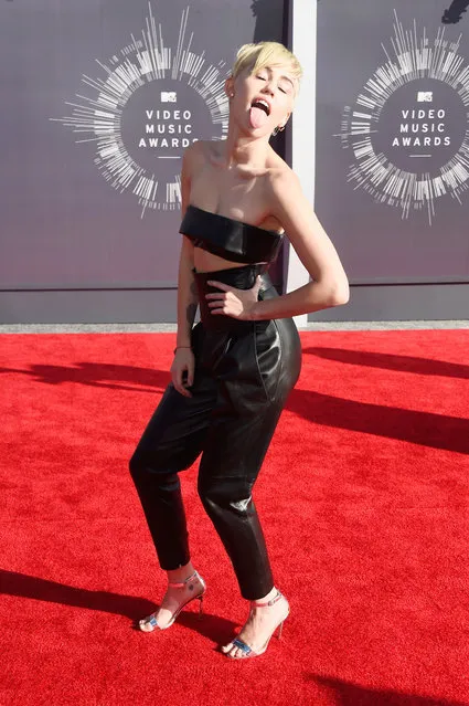 Recording atist Miley Cyrus attends the 2014 MTV Video Music Awards at The Forum on August 24, 2014 in Inglewood, California. (Photo by Frazer Harrison/Getty Images)