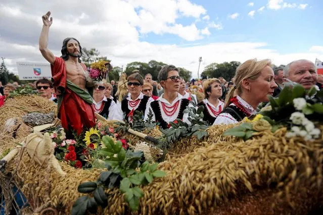 People attend holy mass during a harvest festival at Jasna Gora in Czestochowa, Poland, September 6, 2015. (Photo by Grzegorz Skowronek/Reuters/Agencja Gazeta)