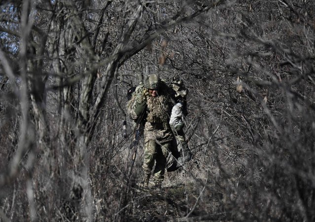 Servicemen of the Alkatraz special rifle battalion, former prisoners who volunteered to defend Ukraine, of the 93rd Motorized Brigade take part in a military drills in an undisclosed location in the Donetsk region on February 13, 2025, amid the Russian invasion of Ukraine. (Photo by Genya Savilov/AFP Photo)