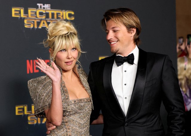 Cast member Millie Bobby Brown and her husband Jake Bongiovi attend a premiere for the film “The Electric State” in Los Angeles on February 25, 2025. (Photo by Mario Anzuoni/Reuters)