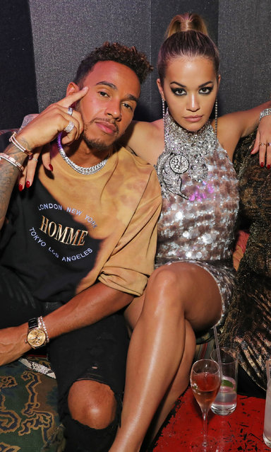 Lewis Hamilton (L) and Rita Ora attend the LOVE magazine x Miu Miu party, held during London Fashion Week, in association with Absolut Elyx & Perrier Jouet at Loulou's on September 18, 2017 in London, England. (Photo by David M. Benett/Dave Benett/Getty Images for LOVE)