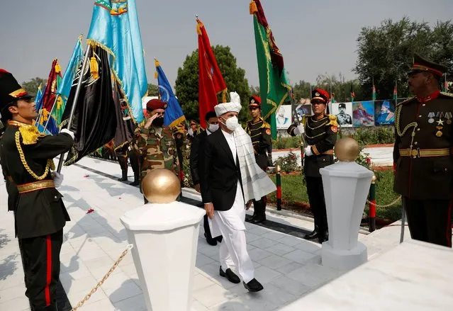 Afghanistan's President Ashraf Ghani (C) attends Afghan Independence Day celebrations in Kabul, Afghanistan on August 18, 2020. (Photo by Mohammad Ismail/Reuters)