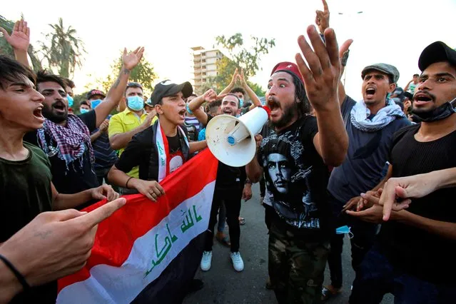 Anti-government protesters gather for a demonstration demanding better public services and against corruption outside the provincial council building, in Basra, Iraq, Friday, August 7, 2020. (Photo by Nabil al-Jurani/AP Photo)