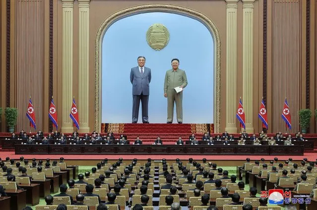 This picture taken on December 26, 2022 and released from North Korea's official Korean Central News Agency (KCNA) on December 27, 2022 shows North Korea's leader Kim Jong Un (front C) attending a report on the 50th anniversary of the establishment of the Korean socialist constitution, at the Mansudae National Assembly Hall in Pyongyang. (Photo by KCNA via KNS/AFP Photo)