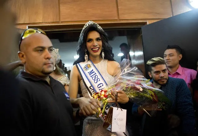 In this October 18, 2015 photo, Argenis Gonzalez wears the Miss Gay Venezuela crown after winning the beauty pageant in Caracas, Venezuela. "It's a great achievement to get to be the face of what is such a large community in Latin America, and even bigger in our country", said Gonzalez, a 24-year-old social media coordinator. "And to have so many straight people cheering us on makes me feel really privileged". (Photo by Ariana Cubillos/AP Photo)