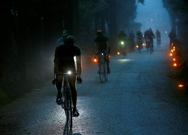 Cyclists ride vintage bicycles on gravel roads during the Strade Bianche section of the “Eroica” cycling race for old bikes in Gaiole in Chianti, Italy October 2, 2016. (Photo by Stefano Rellandini/Reuters)