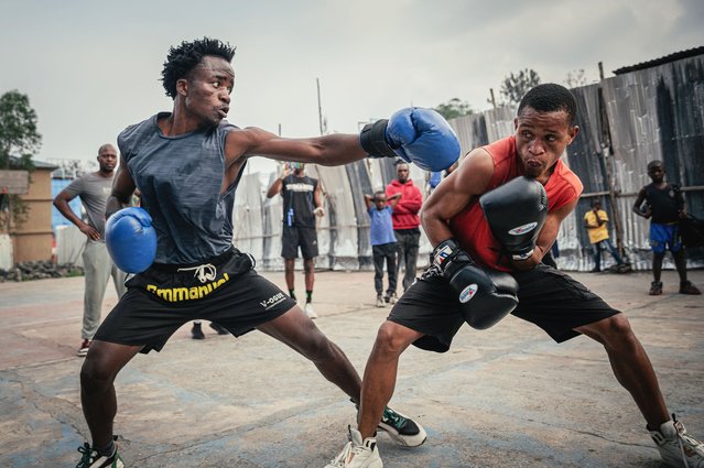 Two young boxers from Virunga Club spar during a morning training session in Goma, Democratic Republic of the Congo on July 13, 2025. (Photo by Jospin Mwisha/AFP Photo)
