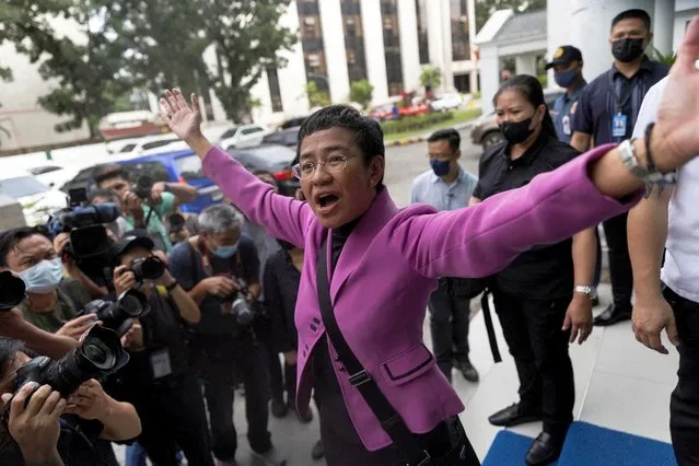 Rappler CEO and Nobel Laureate Maria Ressa gestures after a Manila court acquitted her from a tax evasion case, outside the Court of Tax Appeals in Quezon City, Philippines, January 18, 2023. (Photo by Eloisa Lopez/Reuters)