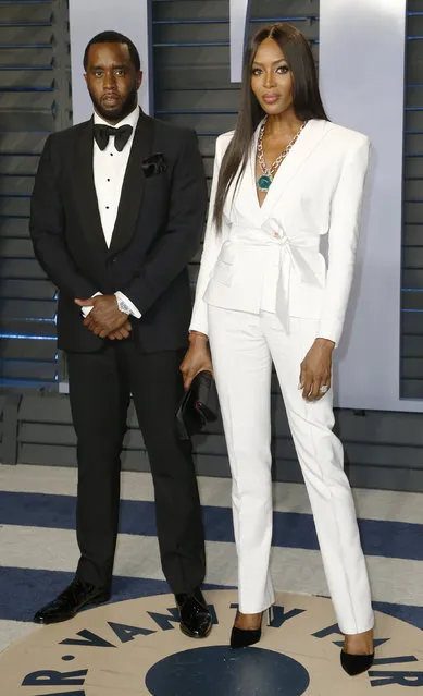 P. Diddy and Naomi Campbell attend the 2018 Vanity Fair Oscar Party hosted by Radhika Jones at the Wallis Annenberg Center for the Performing Arts on March 4, 2018 in Beverly Hills, California. (Photo by Danny Moloshok/Reuters)