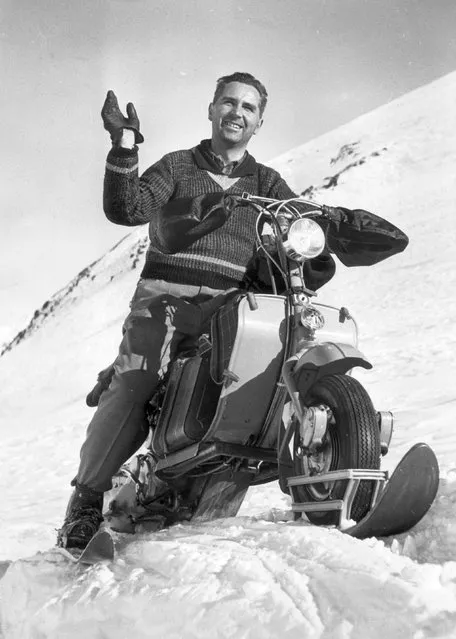 Jean Studer riding a motor-bike on skis on a snow covered pass in the “Cantine de Proz”, circa 1955.  (Photo by Fox Photos/Getty Images)