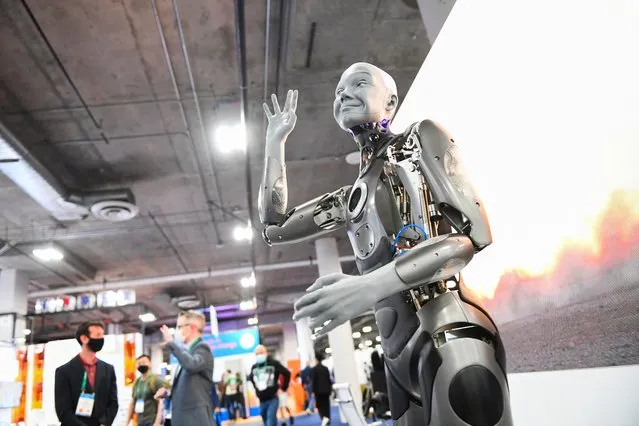 The Engineered Arts Ameca humanoid robot with artificial intelligence gestures as it is demonstrated during the Consumer Electronics Show (CES) on January 5, 2022 in Las Vegas, Nevada. (Photo by Patrick T. Fallon/AFP Photo)