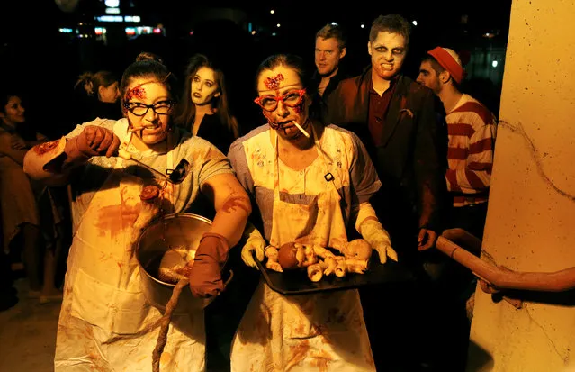 School lunch lady Zombies take part in the annual Silver Spring Zombie Walk before Halloween in Silver Spring, Maryland, U.S., October 29, 2016. (Photo by Gary Cameron/Reuters)