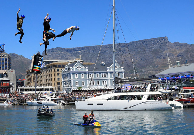 Participants jump out of a self-made flying machine during the Red Bull Flugtag 2025 Cape Town competition at the V&A Waterfront in Cape Town, South Africa, on November 2, 2025. (Photo by Esa Alexander/Reuters)