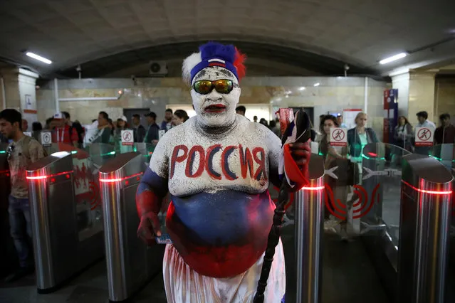 Zomo, Russia's fan from Cameroon in the metro at the 2018 soccer World Cup in Moscow, Russia on June 20, 2018. (Photo by Carl Recine/Reuters)