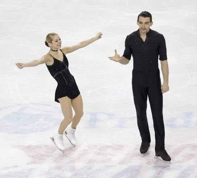 Alexa Scimeca, left, and Christopher Knierim react after their performance during the pairs short program at the U.S. Figure Skating Championships in Greensboro, N.C., Thursday, January 22, 2015. (Photo by Chuck Burton/AP Photo)