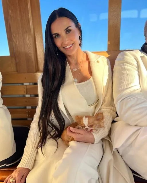 American actress Demi Moore and Pilaf head to Stockholmon on June 11, 2023 for Max Mara's dinner party. (Photo by demimoore/Instagram)