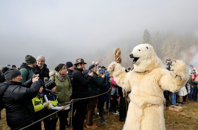 A participant dressed as a bear attends the traditional Schleicherlaufen run during Shrovetide (Fasnacht) in Telfs, Austria on February 2, 2025. (Photo by Leonhard Foeger/Reuters)